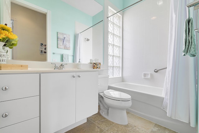 full bathroom featuring vanity, shower / tub combo, and toilet