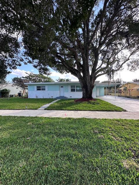 view of front of home with a front yard