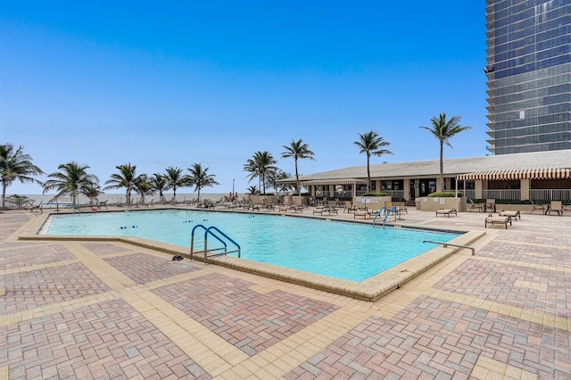 view of pool featuring a patio