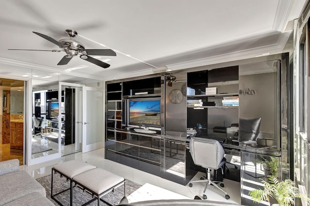 office area with light tile patterned floors, ceiling fan, and crown molding