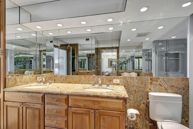 bathroom featuring vanity and walk in shower