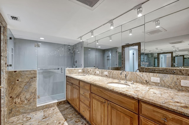 bathroom featuring vanity and walk in shower