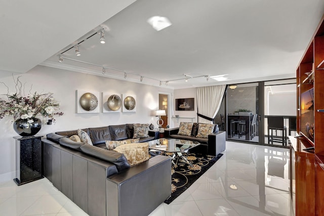 tiled living room with expansive windows and crown molding