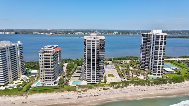 aerial view featuring a water view and a view of the beach