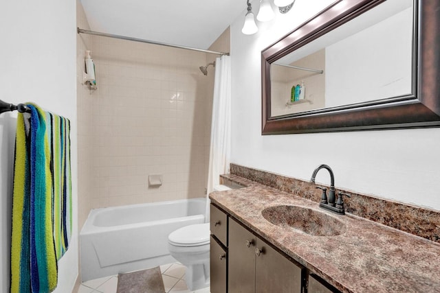 full bathroom featuring tile patterned flooring, vanity, toilet, and shower / tub combo