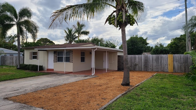 view of front of home with a front yard