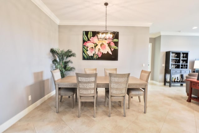 dining room with a notable chandelier and crown molding