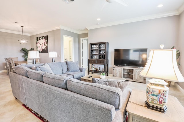 living room with crown molding and light tile patterned floors