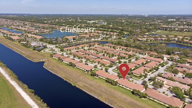 bird's eye view featuring a residential view and a water view