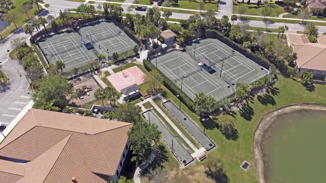 birds eye view of property with a water view