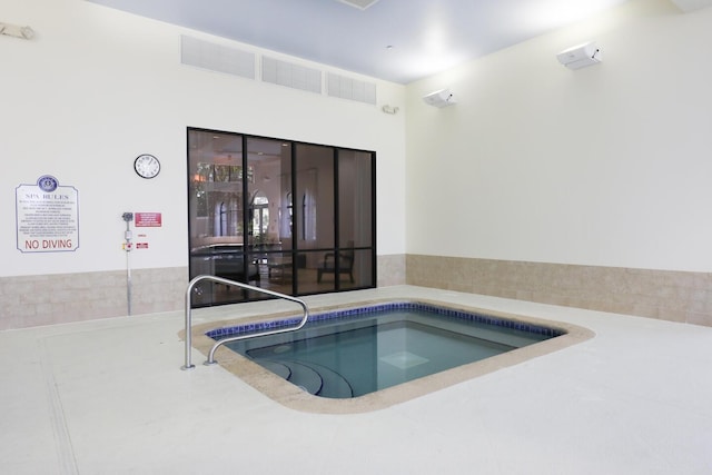 view of pool featuring an indoor in ground hot tub