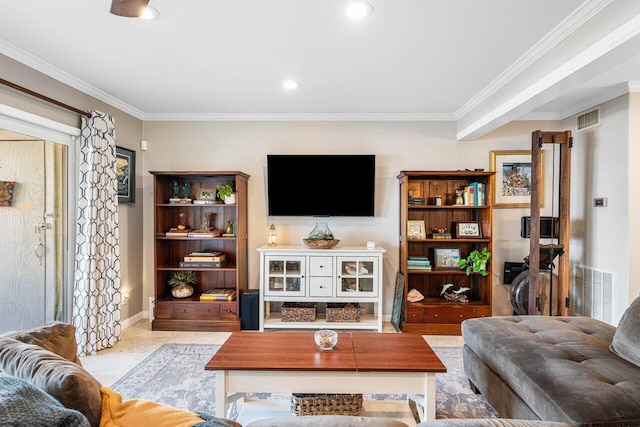 living room with ornamental molding