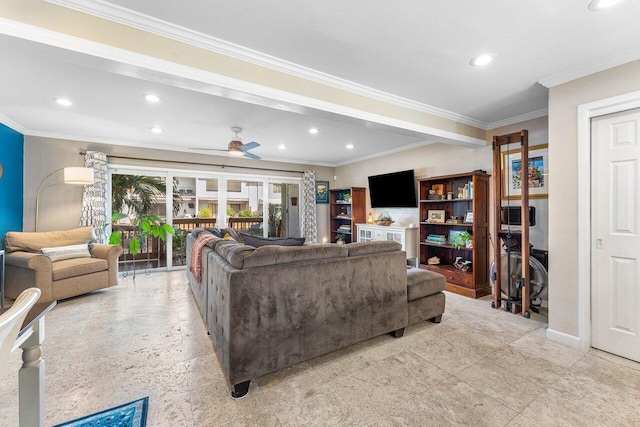 living room with ceiling fan and ornamental molding