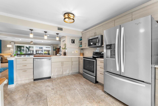 kitchen featuring sink, hanging light fixtures, kitchen peninsula, light brown cabinetry, and appliances with stainless steel finishes