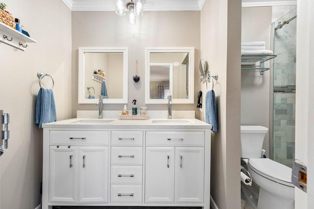 bathroom with vanity, toilet, a shower with shower door, and crown molding