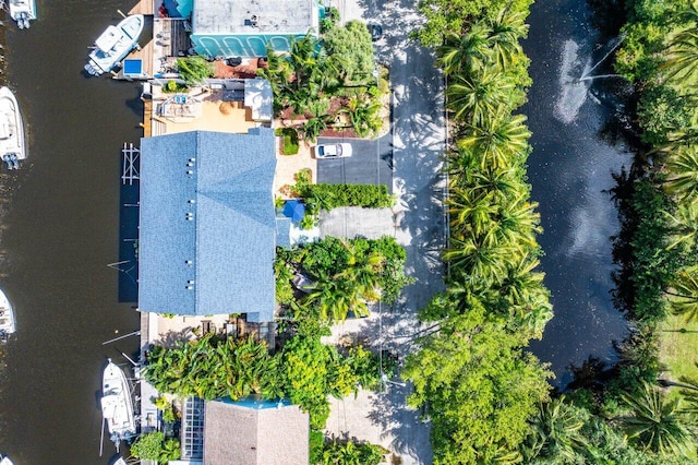 birds eye view of property featuring a water view