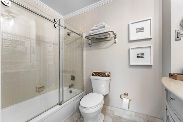 full bathroom featuring vanity, toilet, ornamental molding, and bath / shower combo with glass door