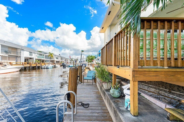 dock area featuring a water view