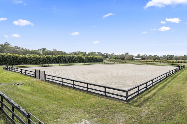 view of yard with a rural view