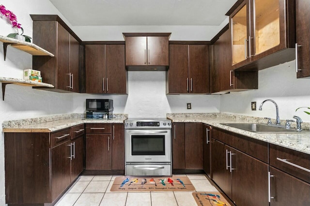 kitchen with sink, light stone counters, stainless steel electric stove, dark brown cabinets, and light tile patterned floors