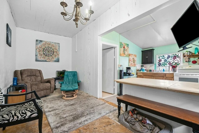 living room featuring a notable chandelier