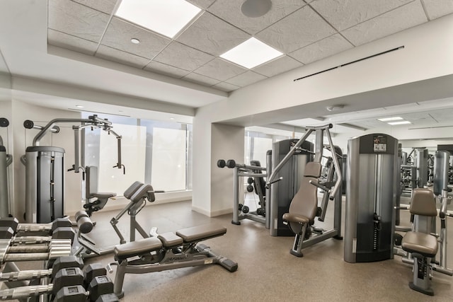 exercise room with a drop ceiling