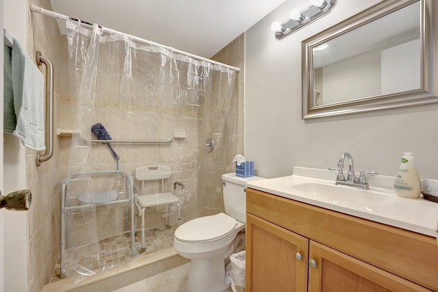 bathroom featuring tile patterned floors, vanity, toilet, and a shower with curtain