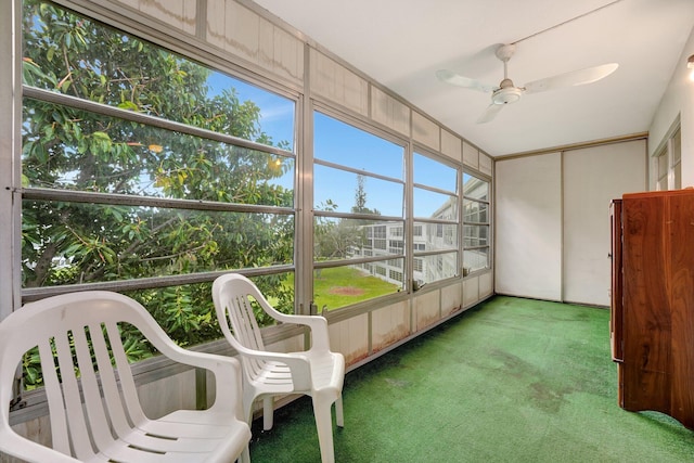 sunroom / solarium with ceiling fan