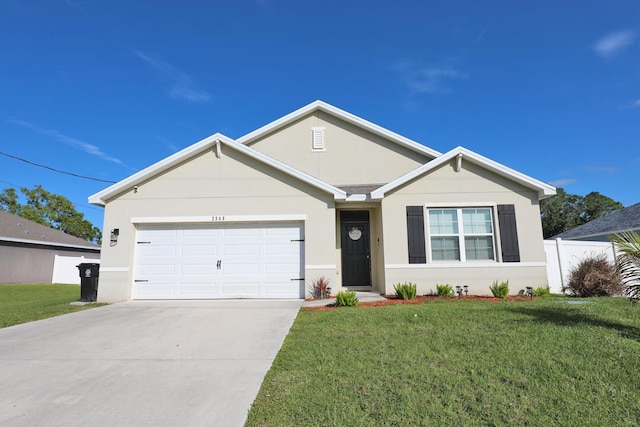 single story home with a garage, concrete driveway, a front yard, and stucco siding