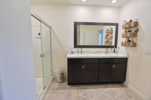 bathroom with vanity and walk in shower