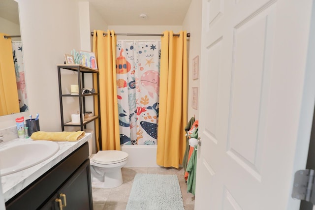 full bathroom with tile patterned floors, vanity, toilet, and shower / bath combo with shower curtain