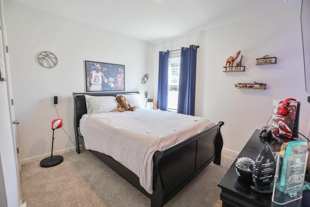 bedroom featuring carpet flooring