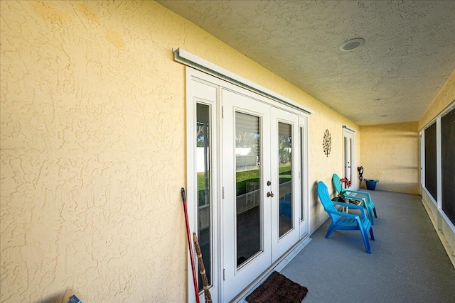 balcony featuring french doors