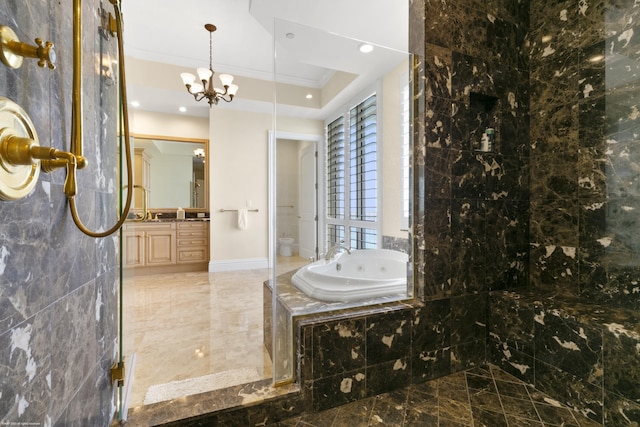 bathroom featuring an inviting chandelier, a raised ceiling, tiled bath, crown molding, and vanity