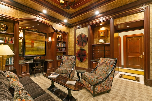 living area with built in shelves, light colored carpet, crown molding, and coffered ceiling