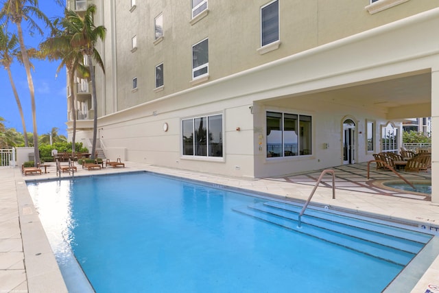 view of pool with a patio