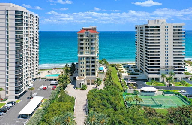 bird's eye view with a view of the beach and a water view