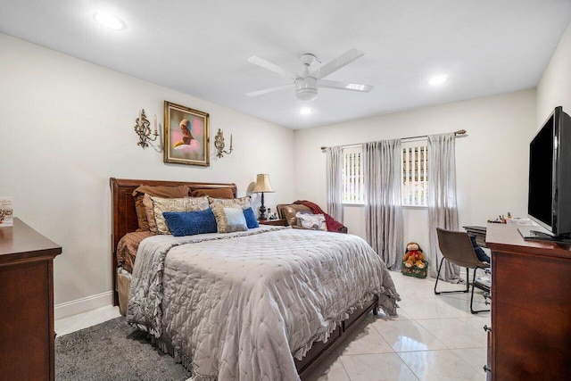 bedroom with ceiling fan and light tile patterned floors