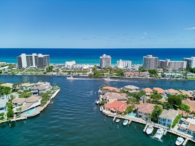 birds eye view of property featuring a water view