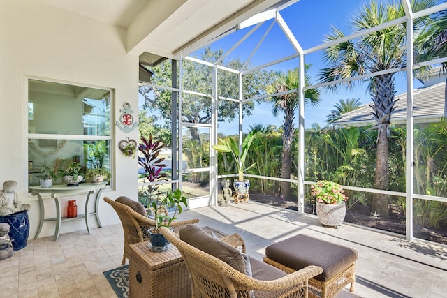 sunroom / solarium featuring a pool