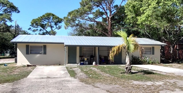 view of front of home with metal roof