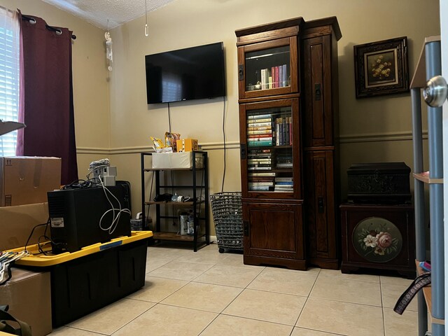 room details with fridge and decorative light fixtures