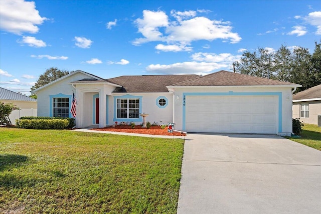 ranch-style house with a garage and a front lawn