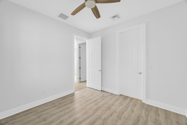 unfurnished bedroom featuring ceiling fan and light hardwood / wood-style floors