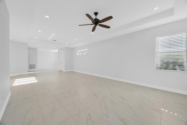 empty room featuring ceiling fan