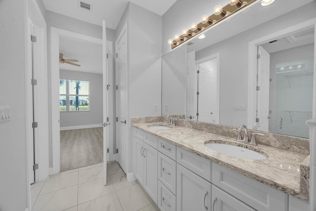 bathroom featuring vanity and ceiling fan