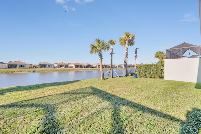 view of yard with a water view