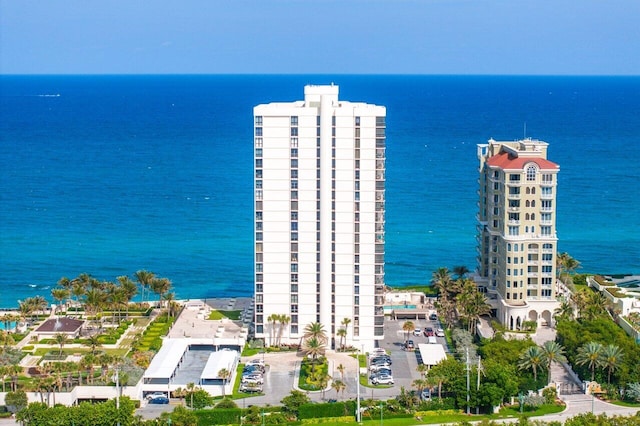 birds eye view of property featuring a water view