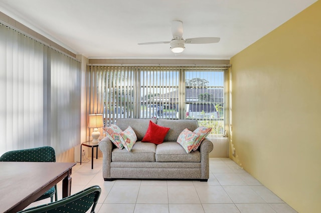 tiled living room with ceiling fan