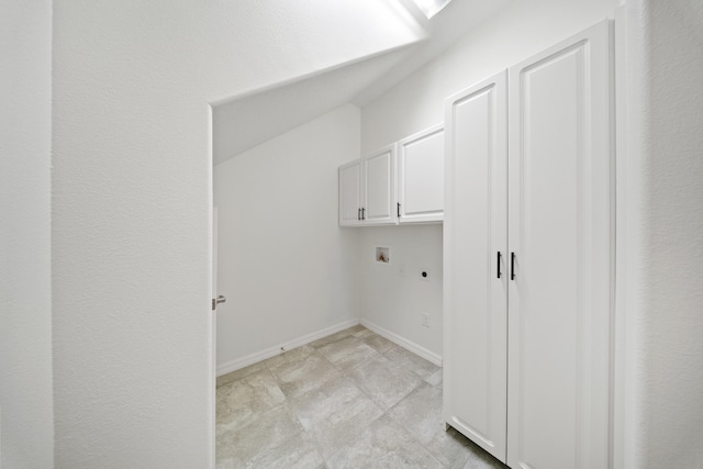 clothes washing area featuring washer hookup, electric dryer hookup, and cabinets